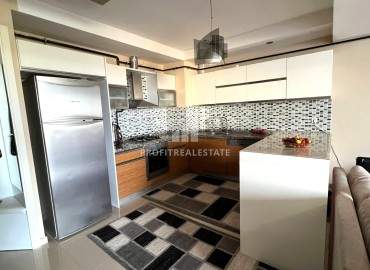 Cozy two bedroom apartment, 120m², in a residence with a water park 100m from the sea in Teje, Mersin ID-13914 фото-3