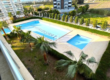 Cozy two bedroom apartment, 120m², in a residence with a water park 100m from the sea in Teje, Mersin ID-13914 фото-6