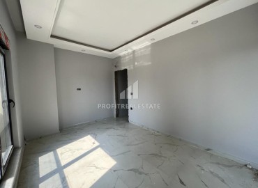 Недорогая трехкомнатная квартира в новостройке, 80м2, без мебели, на финальном этапе строительства в Авсалларе, Аланья ID-13923 фото-6