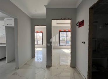 Недорогая трехкомнатная квартира в новостройке, 80м2, без мебели, на финальном этапе строительства в Авсалларе, Аланья ID-13923 фото-11
