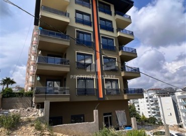 Недорогая трехкомнатная квартира в новостройке, 80м2, без мебели, на финальном этапе строительства в Авсалларе, Аланья ID-13923 фото-12