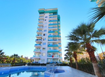 Двухкомнатная квартира в современном комплексе в курортном районе Алании Махмутлар на расстоянии 450 метров от муниципальных пляжей района ID-1078 фото-1