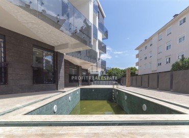 Новая квартира 1+1 в жилом комплексе 2023 года, Гюзельоба, Анталия, 55 м2 ID-13941 фото-17