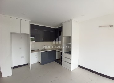 Unfurnished one bedroom apartment, 50m2, in a new cozy residence, 500 meters from the sea in Kestel, Alanya ID-13962 фото-2