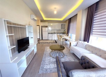 Furnished one-bedroom apartment 60m2, designer interior, 400 meters from the beach, Tosmur, Alanya ID-13698 фото-2