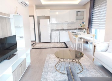 Furnished one-bedroom apartment 60m2, designer interior, 400 meters from the beach, Tosmur, Alanya ID-13698 фото-3