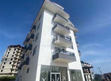 Апартаменты 1+1 и 2+1 пентхаусы, 57-120м², в комплексе с инфраструктурой в Авсалларе в 2000м от моря на этапе ввода в эксплуатацию ID-14000 фото-9