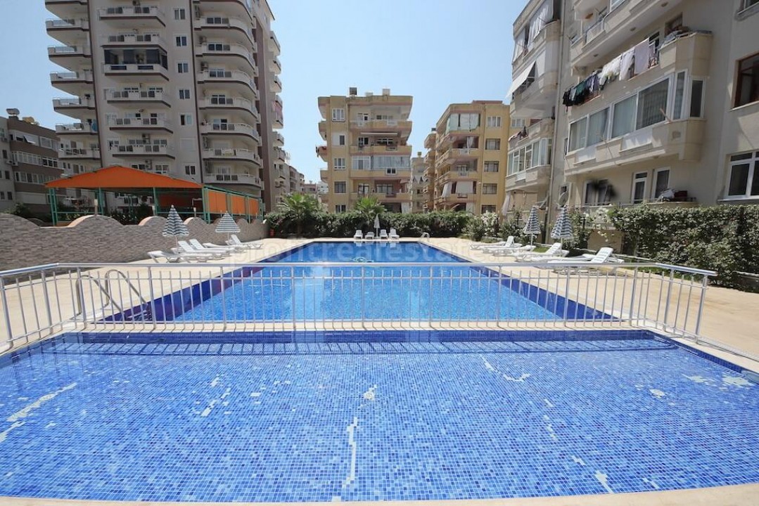 Красивая и светлая  квартира с огромной террасой в большом комплексе на улице Ататюрка, район Махмутлар ID-1089 фото-1