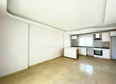 Apartment with two bedrooms, 100m², in a residence with a swimming pool, 250m from the sea in Tej, Mersin ID-14041 фото-4