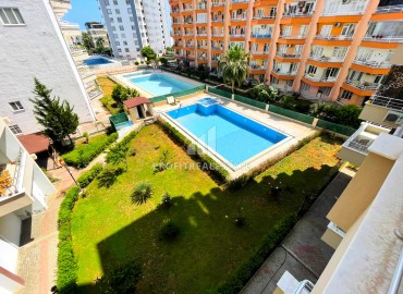 Apartment with two bedrooms, 100m², in a residence with a swimming pool, 250m from the sea in Tej, Mersin ID-14041 фото-7