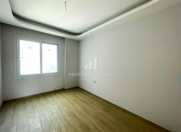 Квартира с двумя спальнями, 100м², в комплексе с бассейном, в 250м от моря в Тедже, Мерсин ID-14041 фото-8