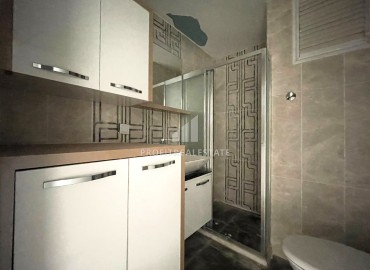 Квартира с двумя спальнями, 100м², в комплексе с бассейном, в 250м от моря в Тедже, Мерсин ID-14041 фото-10