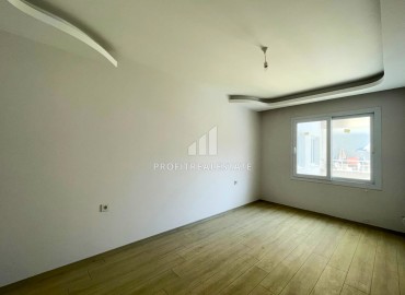 Квартира с двумя спальнями, 100м², в комплексе с бассейном, в 250м от моря в Тедже, Мерсин ID-14041 фото-11