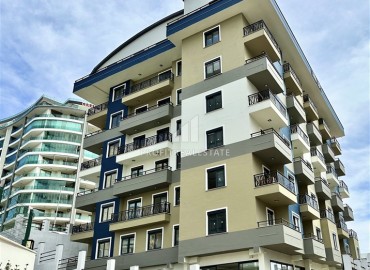 One-bedroom apartment 50 m2, unfurnished, in a new residence with developed facilities, Mahmutlar, Alanya ID-14056 фото-1