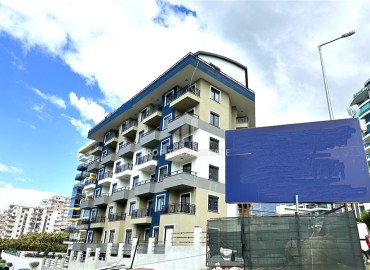 One-bedroom apartment 50 m2, unfurnished, in a new residence with developed facilities, Mahmutlar, Alanya ID-14056 фото-3