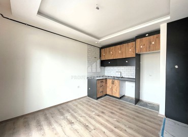 Квартира с одной спальней, 50м², в новом комплексе с инфраструктурой в Тедже, Мерсин ID-14077 фото-4