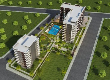 Двухкомнатные и трехкомнатные квартиры, 50-85м², в элитной резиденции на этапе строительства в районе Мерсина - Томюк ID-14081 фото-3