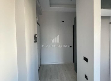 Квартира с одной спальней, 55м², в новом комфортабельном комплексе в районе Томюк, Мерсин ID-14122 фото-11
