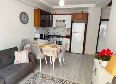 Furnished one-bedroom apartment, 60m², in a premium residence in Mersin, Teje ID-14125 фото-3