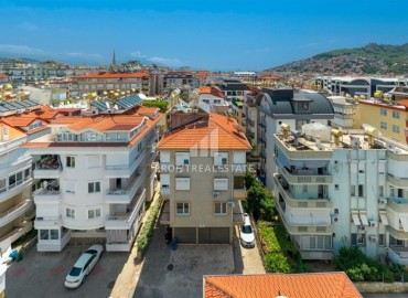 Spacious one-bedroom apartment 70m2, unfurnished, with isolated kitchen, 500 meters from the sea in the center of Alanya ID-14152 фото-1