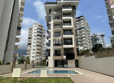 Inexpensive furnished one-bedroom apartment 53 m2, in a new residence with facilities, Mahmutlar, Alanya ID-14160 фото-1