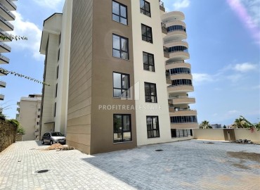 Недорогая меблированная двухкомнатная квартира 53 м2, в новом комплексе с инфраструктурой, Махмутлар, Аланья ID-14160 фото-17