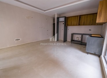 Двухкомнатная квартира без мебели, 55м2, на финальном этапе строительства, в 500 метрах от моря, Махмутлар, Аланья ID-14161 фото-7