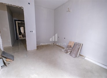 Двухкомнатная квартира без мебели, 55м2, на финальном этапе строительства, в 500 метрах от моря, Махмутлар, Аланья ID-14161 фото-9
