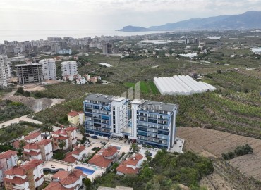 Уютная меблированная двухкомнатная квартира 55м2, с видом на море, в комплексе с инфраструктурой, Махмутлар, Аланья ID-14162 фото-11