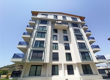 Квартира с тремя спальнями, 115м², в новой резиденции с бассейном в Газипаше, Алания ID-14172 фото-1