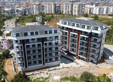 One bedroom apartment, 63m², in a residence under construction, 550m from the sea in Tosmur, Alanya ID-14187 фото-3