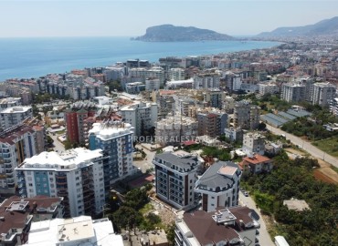 One bedroom apartment, 63m², in a residence under construction, 550m from the sea in Tosmur, Alanya ID-14187 фото-4