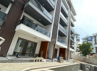 One bedroom apartment, 63m², in a residence under construction, 550m from the sea in Tosmur, Alanya ID-14187 фото-14