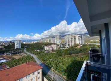 Furnished apartment 1 + 1, 47m², with mountain views in a residence with good facilities in Mahmutlar, Alanya ID-14216 фото-9