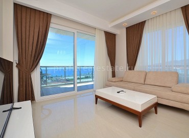 Шикарная квартира планировки 1+1 в комплексе класса люкс с панорамным видом на море в районе Алании Махмутлар ID-1104 фото-1