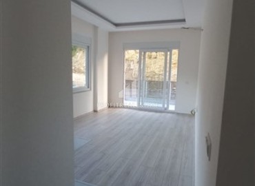 Недорогая двухкомнатная квартира 60 м2, в новой резиденции, без мебели, с кухонным гарнитуром, Аланья ID-14239 фото-2