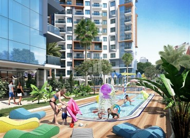 Новая двухкомнатная квартира жилом комплексе премиум-класса, в 150 метрах от центра Махмутлара, Аланья, 60 м2 ID-14253 фото-7