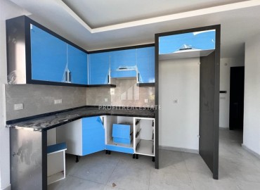 New one bedroom apartment 50 m2, unfurnished, with a kitchen set, in a residence with facilities, Avsallar, Alanya ID-14259 фото-5