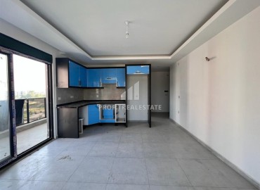 Новая двухкомнатная квартира 50 м2, без мебели, с кухонным гарнитуром, в комплексе с инфраструктурой, Авсаллар, Аланья ID-14259 фото-6