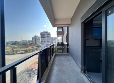 New one bedroom apartment 50 m2, unfurnished, with a kitchen set, in a residence with facilities, Avsallar, Alanya ID-14259 фото-8