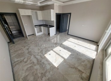 Недорогая двухкомнатная квартира 60 м2, без мебели, с кухонным гарнитуром, в новом жилом комплексе, Авсаллар, Аланья ID-14260 фото-1