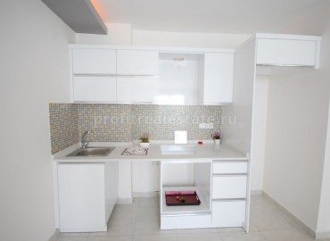 Уютная двухкомнатная квартира 65 кв. м. в резиденции с инфраструктурой класса люкс на берегу Средиземного моря в Махмутларе, Алания ID-1105 фото-17