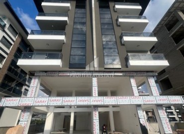 Двухкомнатные апартаменты, 51м², на окончательном этапе строительства, в 150м от моря в районе Каргыджак, Алания ID-14262 фото-18