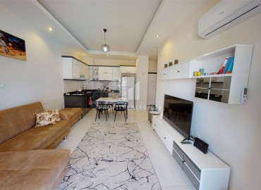 Furnished one-bedroom apartment, 50m², in Oba, Alanya, in a new comfortable residence ID-13920 фото-6