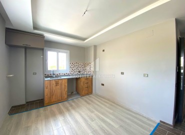 Квартира с одной спальней, 55м², в комплексе с бассейном на этапе ввода в эксплуатацию в Эрдемли, Арпачбахшиш ID-13714 фото-6