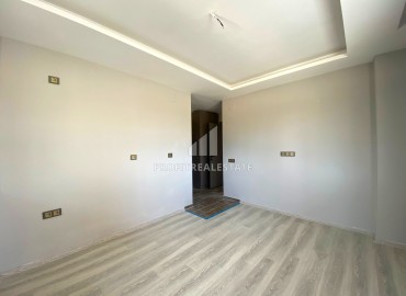 Квартира с одной спальней, 55м², в комплексе с бассейном на этапе ввода в эксплуатацию в Эрдемли, Арпачбахшиш ID-13714 фото-8