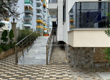 Аренда в Алании: Двухкомнатные апартаменты 50 м2, в 400 метрах от моря в Махмутларе ID-14278 фото-2