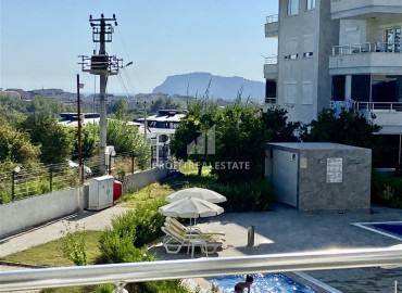 Two bedroom apartment at a bargain price in a picturesque location in Oba, Alanya, 70 m2 ID-14288 фото-9