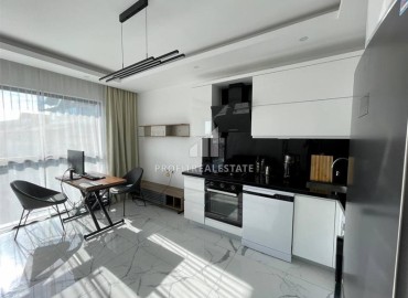 Stylish ergonomic apartment 1 + 1, 45 m2, furnished, in a new residence with facilities, in the center of Alanya ID-14307 фото-1