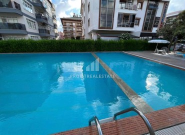 Partially furnished apartment 2 + 1, 85m², with a separate kitchen in a residence with a swimming pool in the center of Oba ID-14310 фото-2